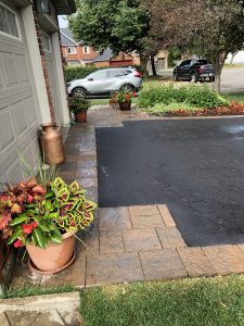 asphalt with interlock detail